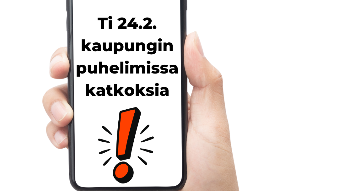 kädessä puhelin, jonka ruudussa tekstiä