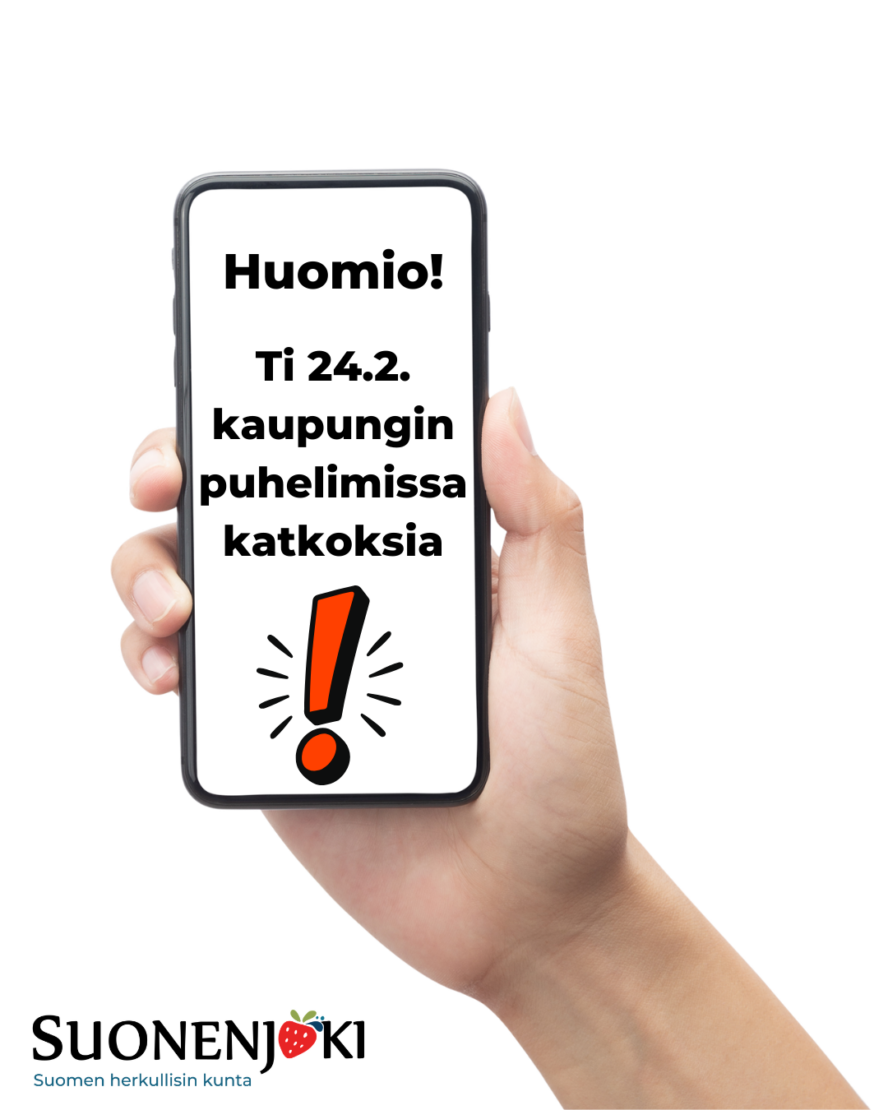 kädessä puhelin, jonka ruudussa tekstiä